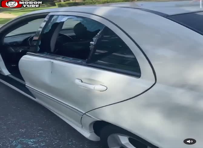 Video :He throws a rock at a man's car to deter him from doing burnouts in their area